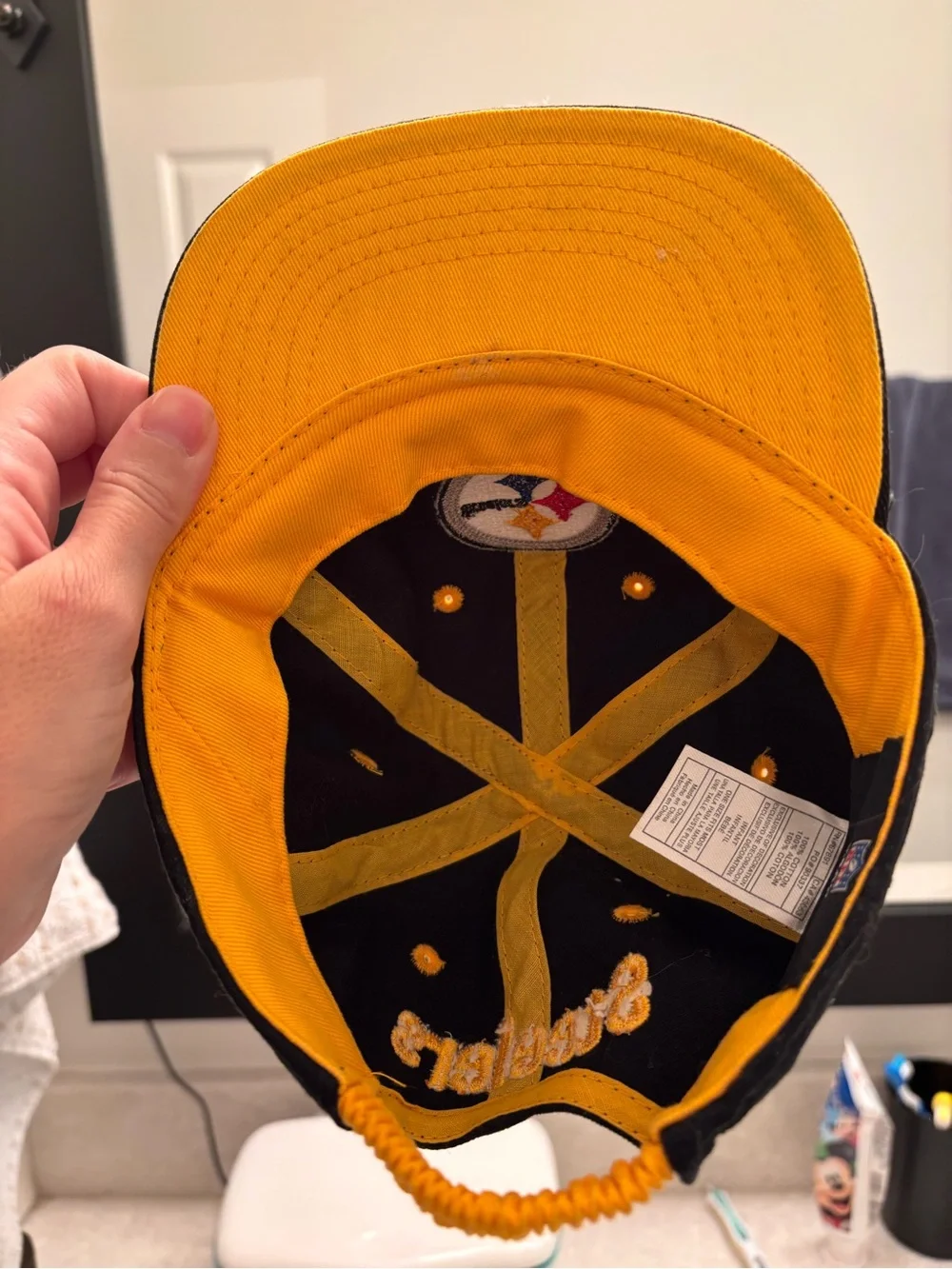 NFL Kids Pittsburgh Steelers Black Cap with Yellow Eyelets and Team Logo